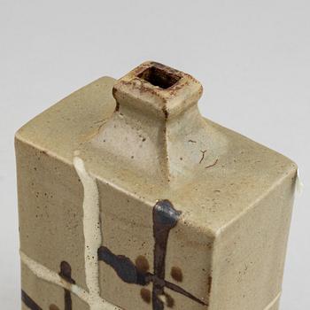 A Japanese sake bottle, in the style of Shojii Hamada, 20th Century.