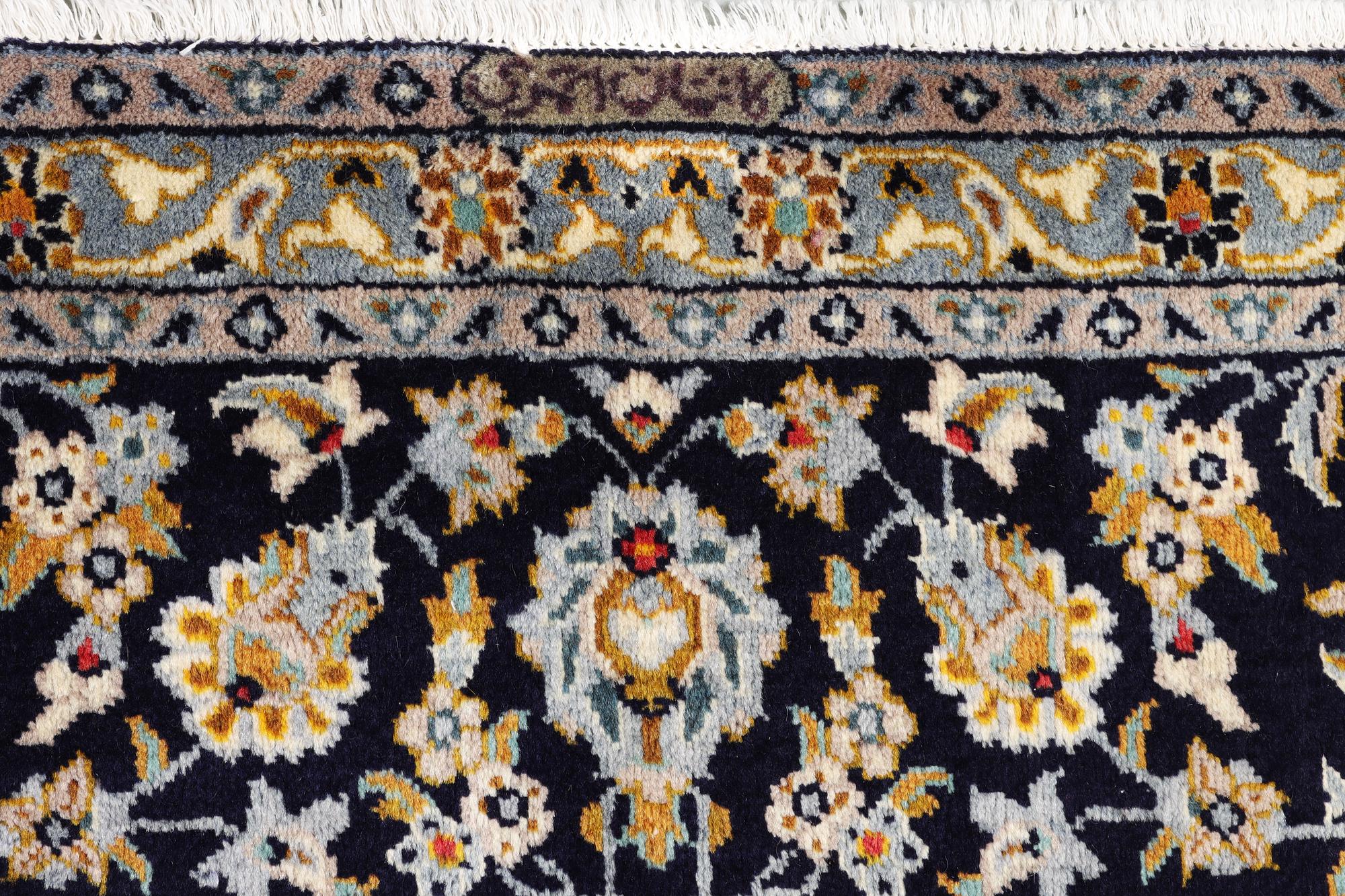 A Kashan carpet, c. 365 x 259 cm.