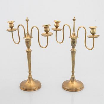 Skultuna Messingsbruk, a pair of 'N 55' brass candelabra, second half of the 19th Century.