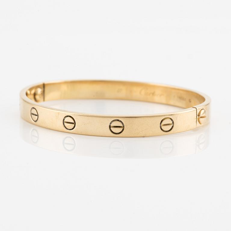 Cartier,.