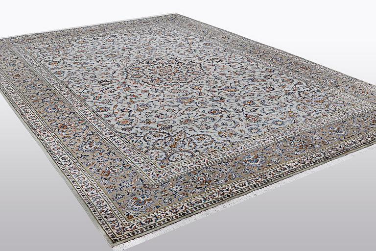 A carpet, Kashan, signed Fani, ca 420 x 300 cm.