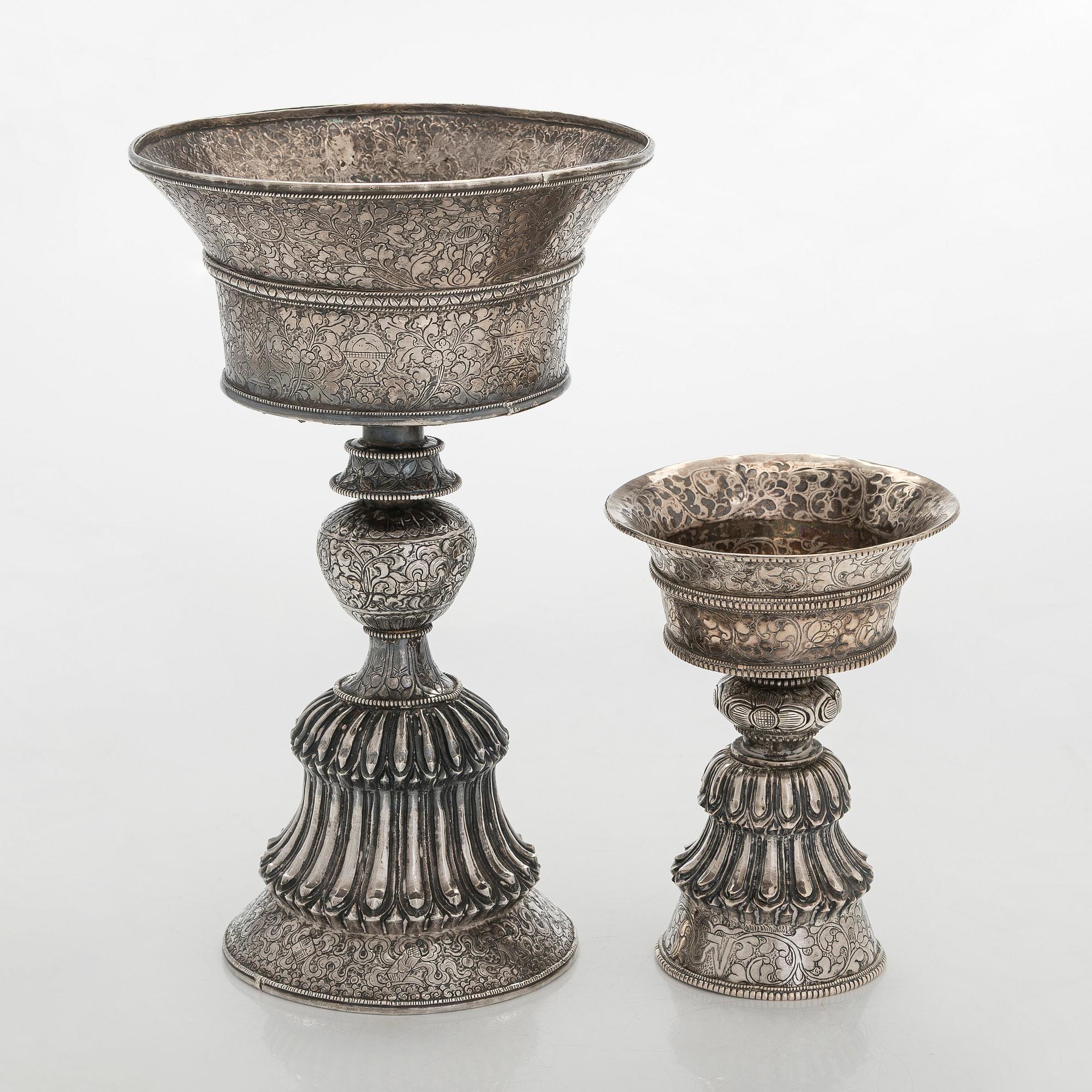 Two silver butter lamps, Tibet, 19th century.
