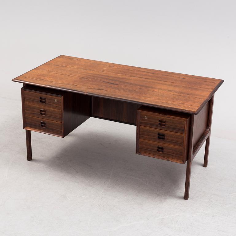 A 1960´s  Danish writing desk veneered with jakaranda, possibly designed by Arne Vodder.