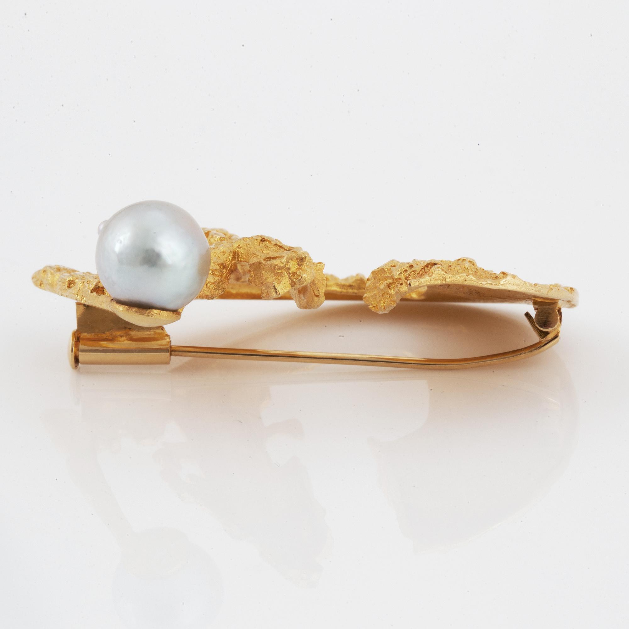 BJÖRN WECKSTRÖM, brooch, "Solskeppet",18K gold and pearl.
