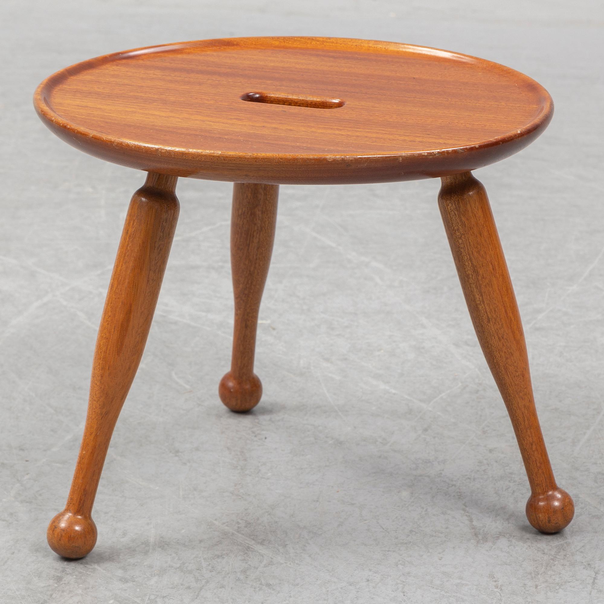 A mahogny stool, model 2156, by Josef Frank for Firma Svenskt Tenn.