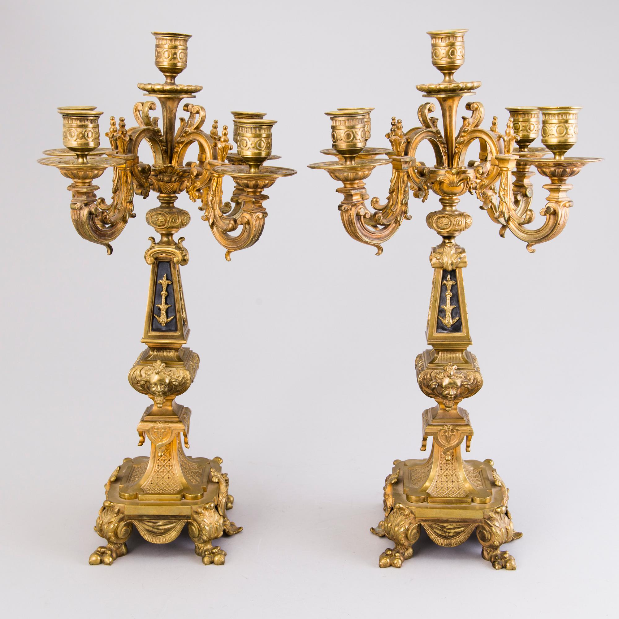 A pair of bronze candelabra from the latter half of the 19th Century.
