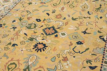 An Indian flat weave carpet of 'Shah Abbas' design, c. 402 x 289 cm.