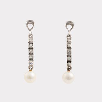 Necklace and earrings, a pair, cultured pearls, white gold, and brilliant- and octagon-cut diamonds.