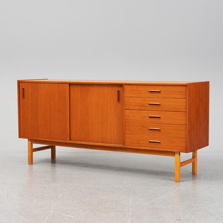 A second half of the 20th century teak veneered sideboard.