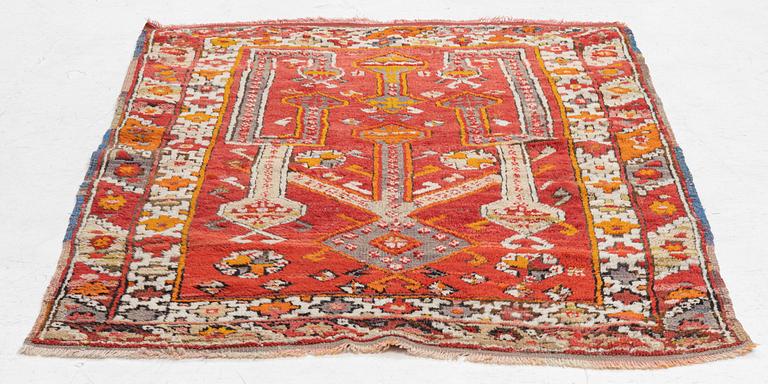 A semi-antique Anatolian rug, possibly Konya, approximately 152 x 117 cm.