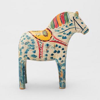 A painted folk art dala horse first half of the 20th century.