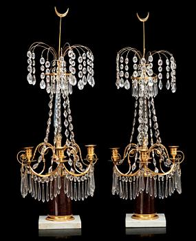 546. A pair of late Gustavian late 18th century three-light table girandoles.