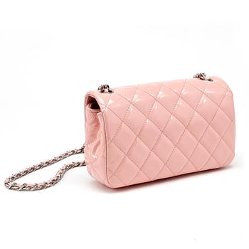 CHANEL, a mini pink quilted patent crossbody bag.