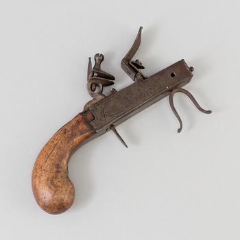 A FLINTLOCK LIGHTER, iron, 18th century.