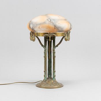 A brass and bronze Art Nouveau table lamp, early 20th century.