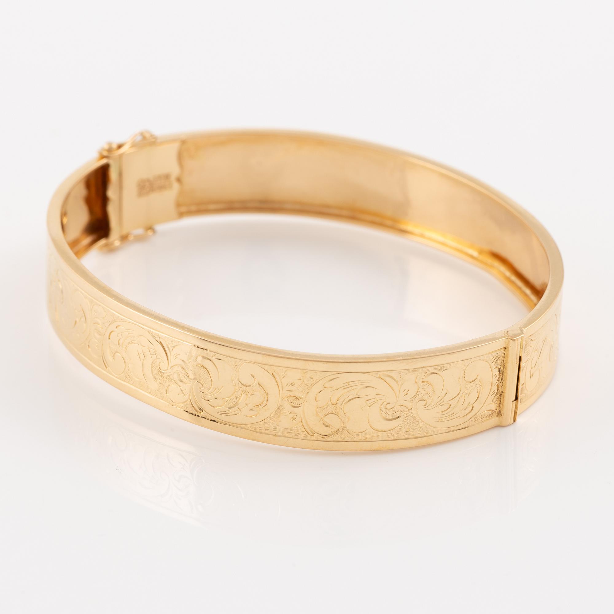 Arm ring 18K gold.
