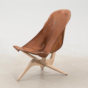 Gösta Westerbergs, a beech and leather easy chair, second half of the 20th Century.