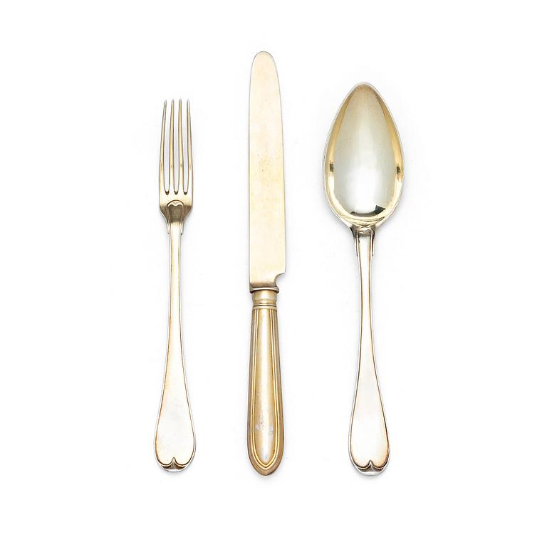 A Swedish 19th / 20th century 36 piece silver-gilt dessert-cutlery, mark of JP Grönvall, Stockholm 1818-1821 and.