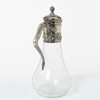 A silver and glass Art Nouveau claret jug, David Andersen, Stockholm, 1901.
