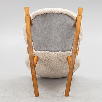 Rocking chair, "Muslingestol" or "Clamchair," Scandinavian Modern, mid-20th century.