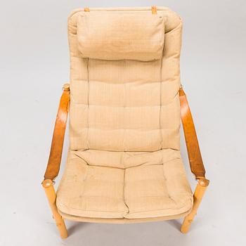 BROR BOIJE, A pair of 'Junker' easy chairs and an ottoman for Dux, Sweden, latter half of the 20th Century.