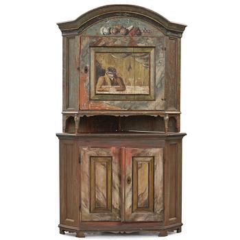 192. A Swedish polychrome-painted corner cabinet attributed to J. Bäckström (1773-1837).