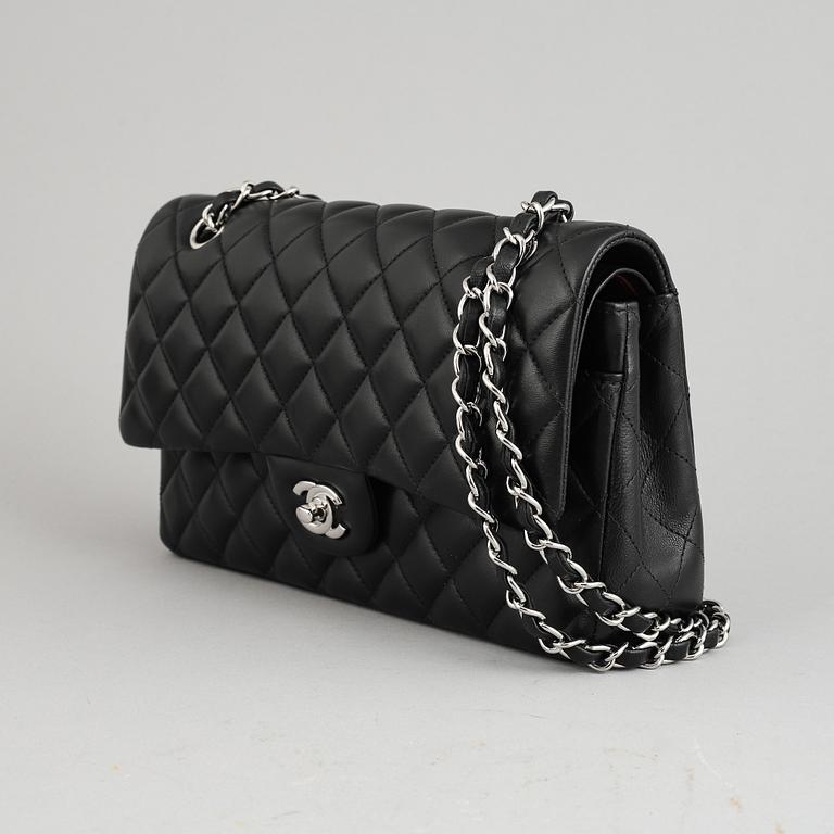 CHANEL, a 'Double Flap' quilted leather handbag, 2013-4.