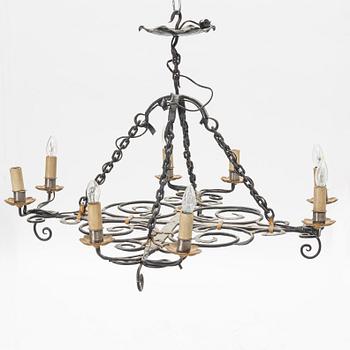 A chalet style wrought iron mid 20th C chandelier.