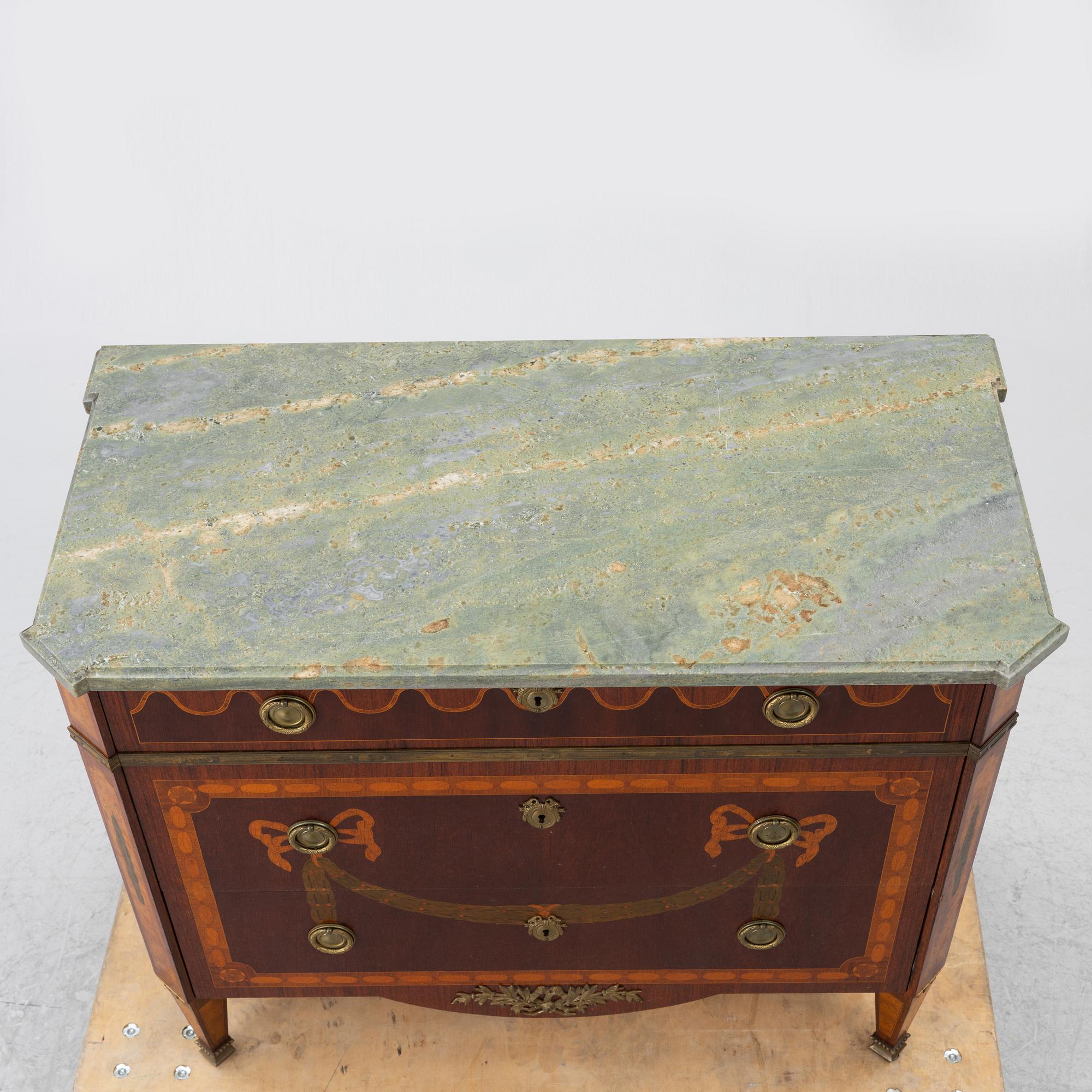 A Gustavian style chest of drawers, 20th century.