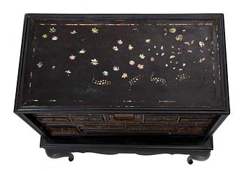 A Japanese black lacquer mother-of-pearl inlayed cabinet, Edo period, presumably Momoyama.