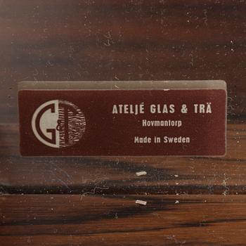 A mirror with a chest of drawer from Ateljé Glas & Trä, mid 20th century.