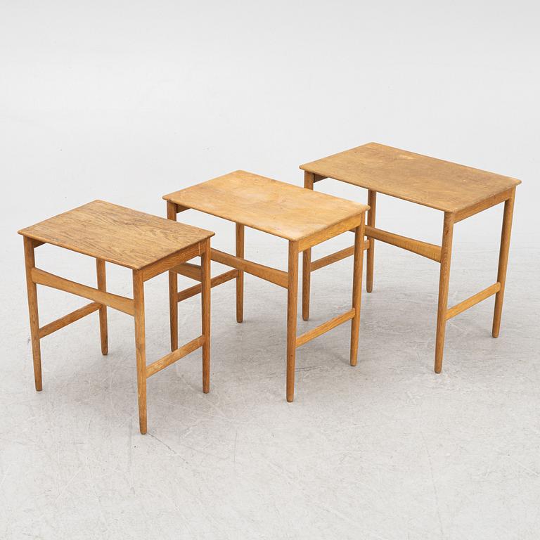 Hans J. Wegner, a nesting table, Andreas Tuck, Denmark, mid 20th Century.