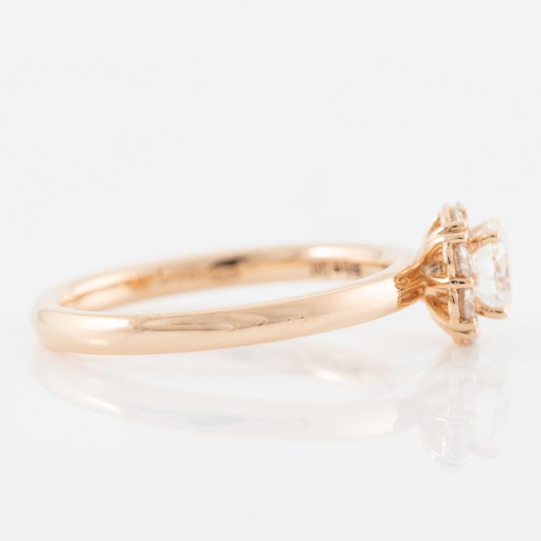 Ring 18K guld med briljantslipad diamant. Medföljande IGI report.