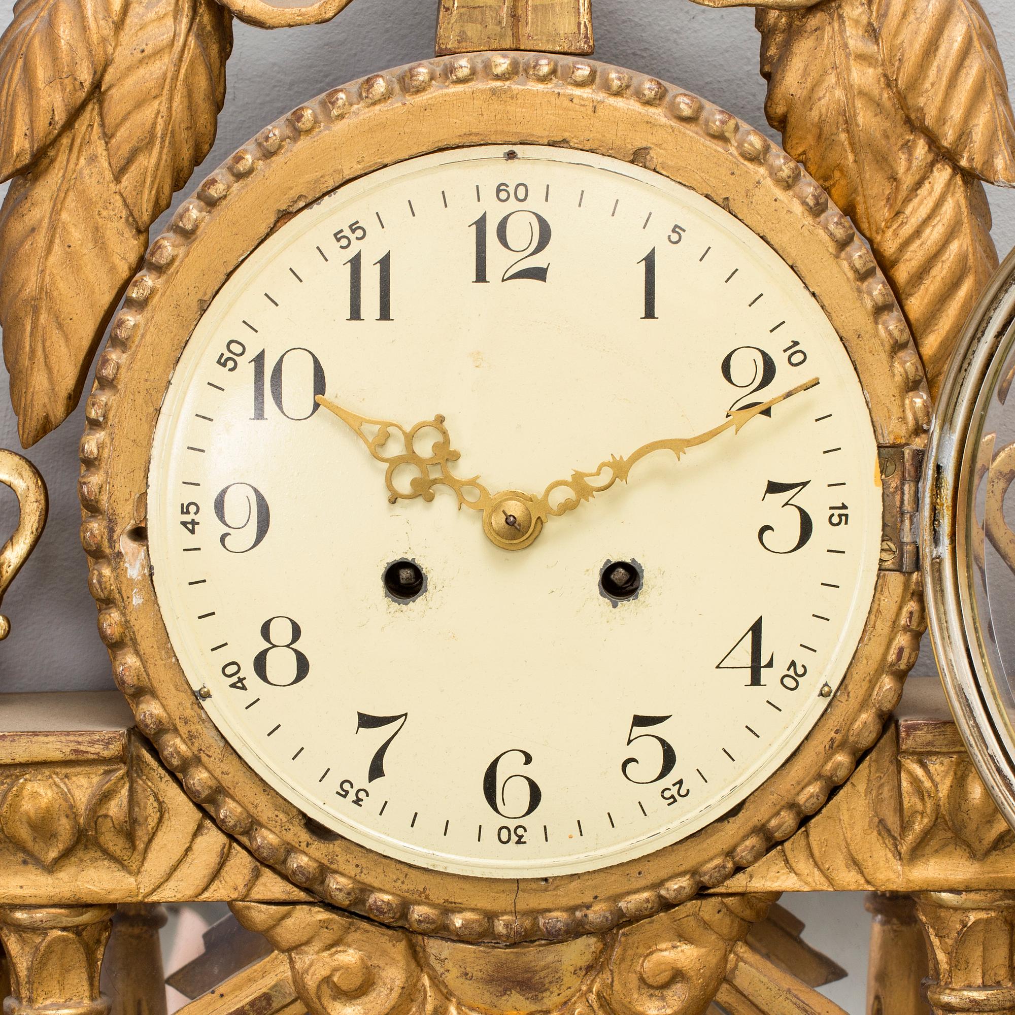 A WALL CLOCK, gustavian style, 20th century.