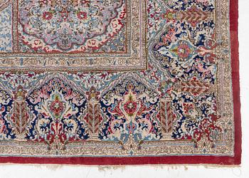 A Kerman carpet, c. 388 x 299 cm.