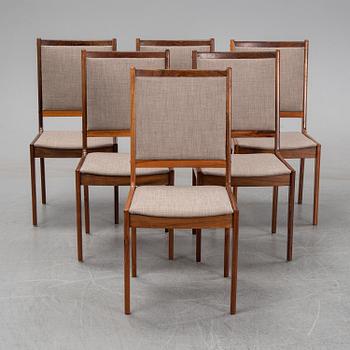 A seven-piece rosewood dining suite, 1960's/70's.