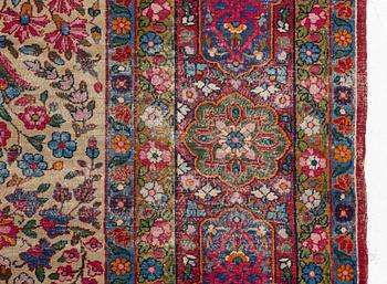 An antique 'Millefleur' Kerman Laver carpet, ca 434 x 321 cm.