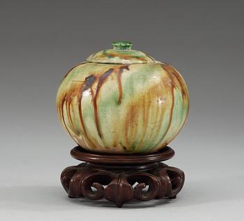 A sancai glazed jar with cover, Tang dynasty (618-907 AD.).