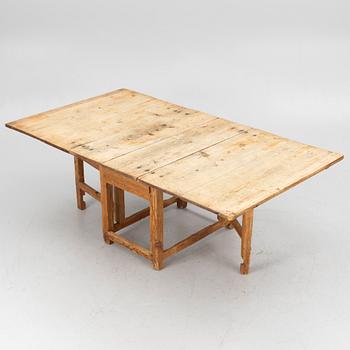 A 19th century gate-leg table.