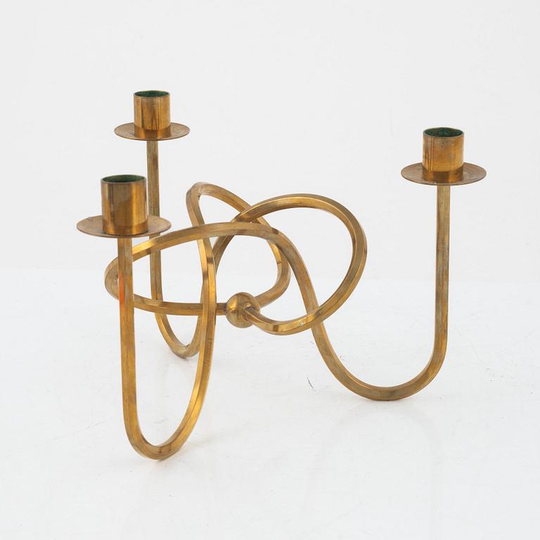 Josef Frank, a brass candelabrum, 'Vänskapsknuten', Firma Svenskt Tenn.