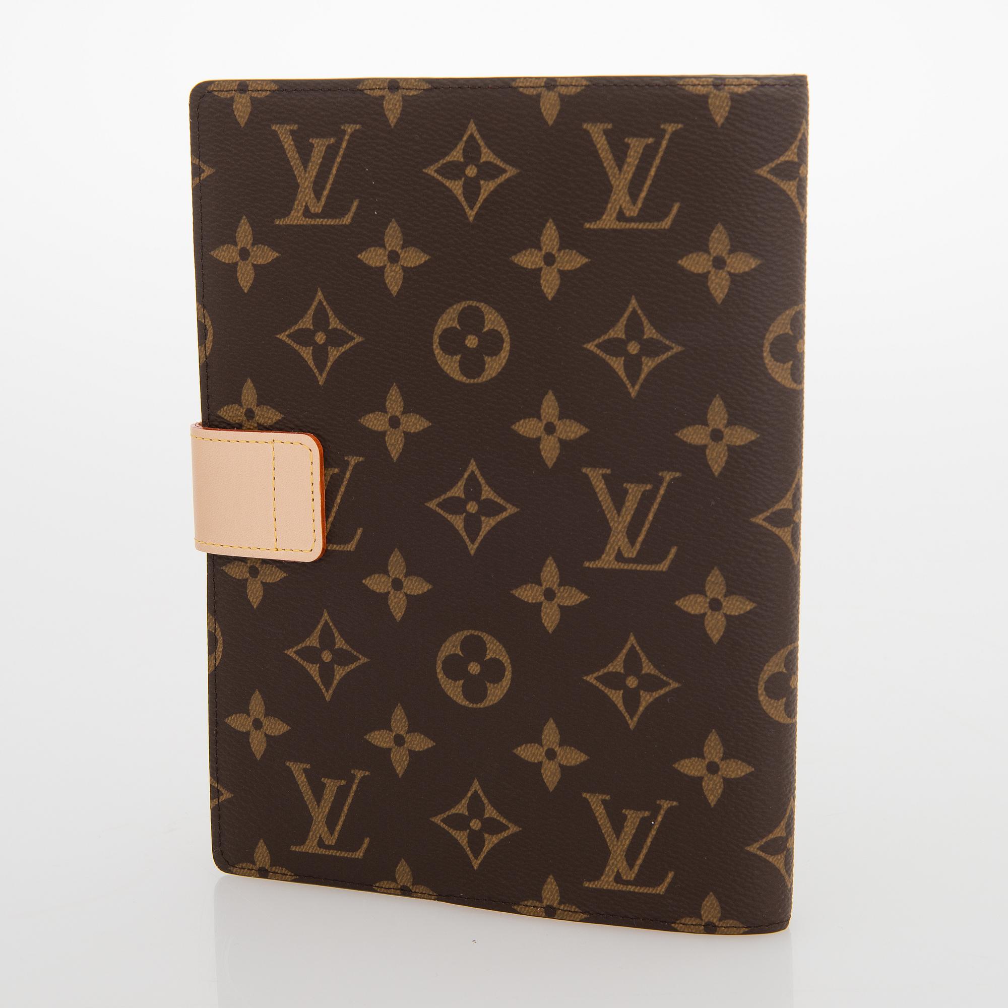 Louis Vuitton, A Monogram canvas Notebook cover 'Paul'.