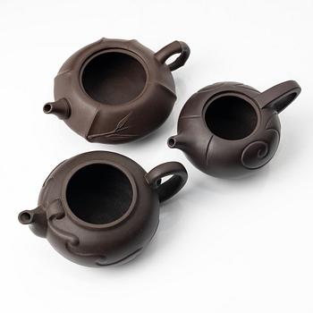 A group of four Chinese brown yixing teapots, 1980/90s.