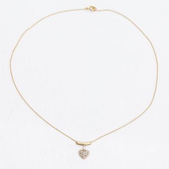 A 14K gold necklace with diamonds ca. 0.08 ct in total.