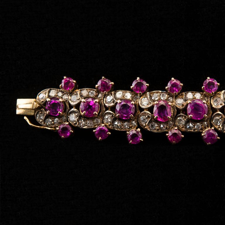 A BRACELET, 132 8/8 cut diamonds c. 2.64 ct. 66 rubies c. 15.80 ct. Weight 35,3 g.