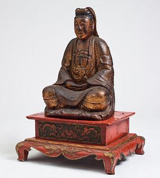 A large wooden gilt lacquer figure of Guanyin, Vietnamese/Southern China, about 1800 or later.