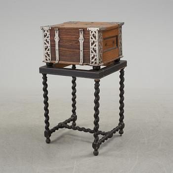 A baroque case on later stand.