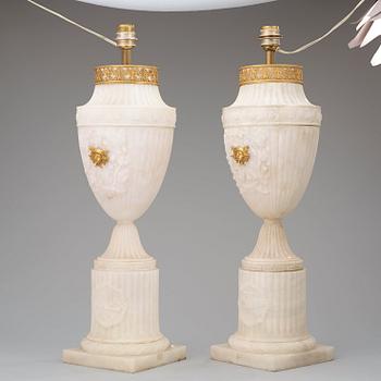 A pair of 19th century alabaster urns.