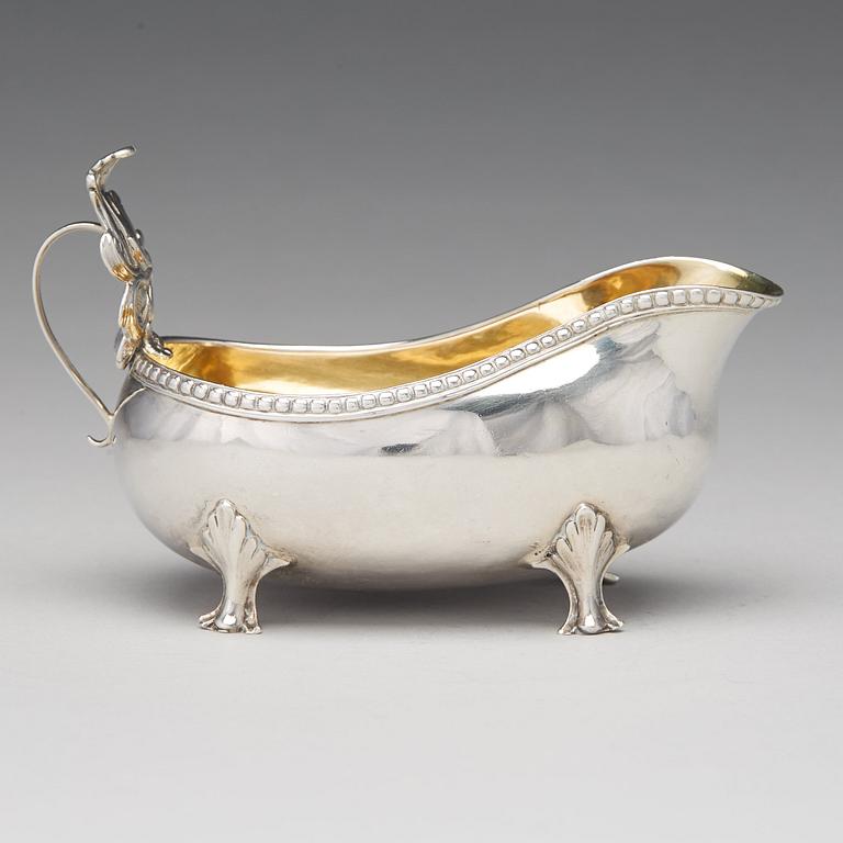 A Swedish Rococo parcel-gilt silver cream-jug, mark of Petter Åkerman, Stockholm 1778.