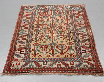 A rug, antique Anatolian/Caucasian, ca 148-149 x 104,5-110 cm (as well as 1-1,5 cm flat weave at one end).