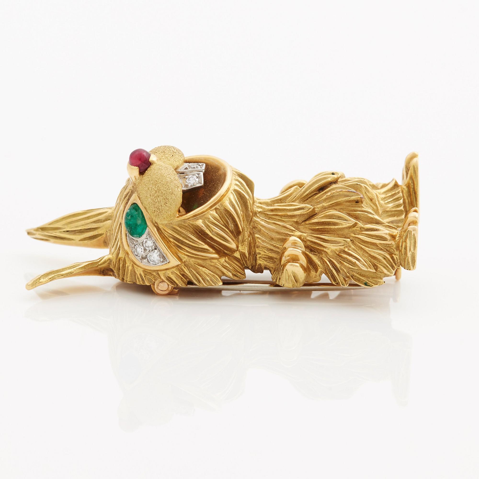 A ruby, cabochon cut emerald, brilliant- and single cut diamond 1950/60's brooch.